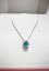 Donnaoro white gold necklace with diamonds and emerald DPE10854.007